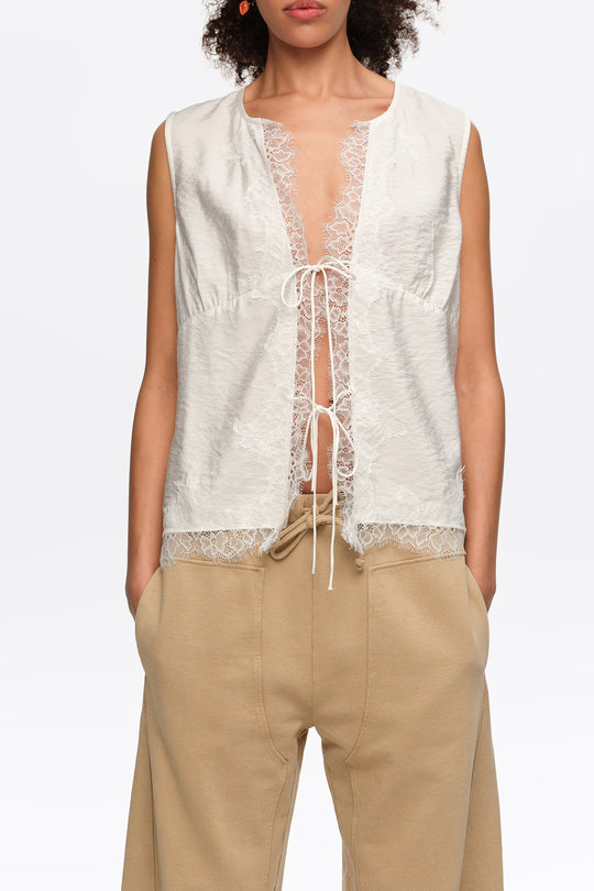 White short-sleeve shirt with lace and ties