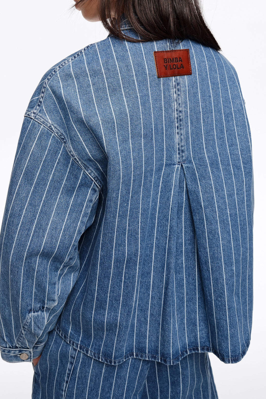 Faded A-line denim jacket with blue stripes