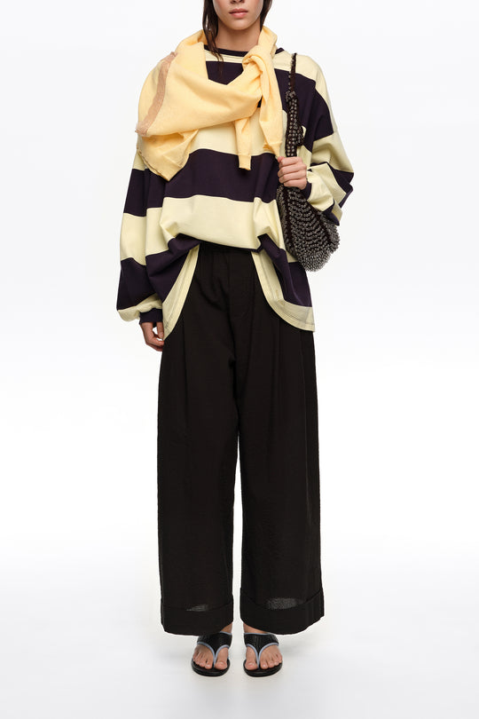 Black textured bell-bottom trousers
