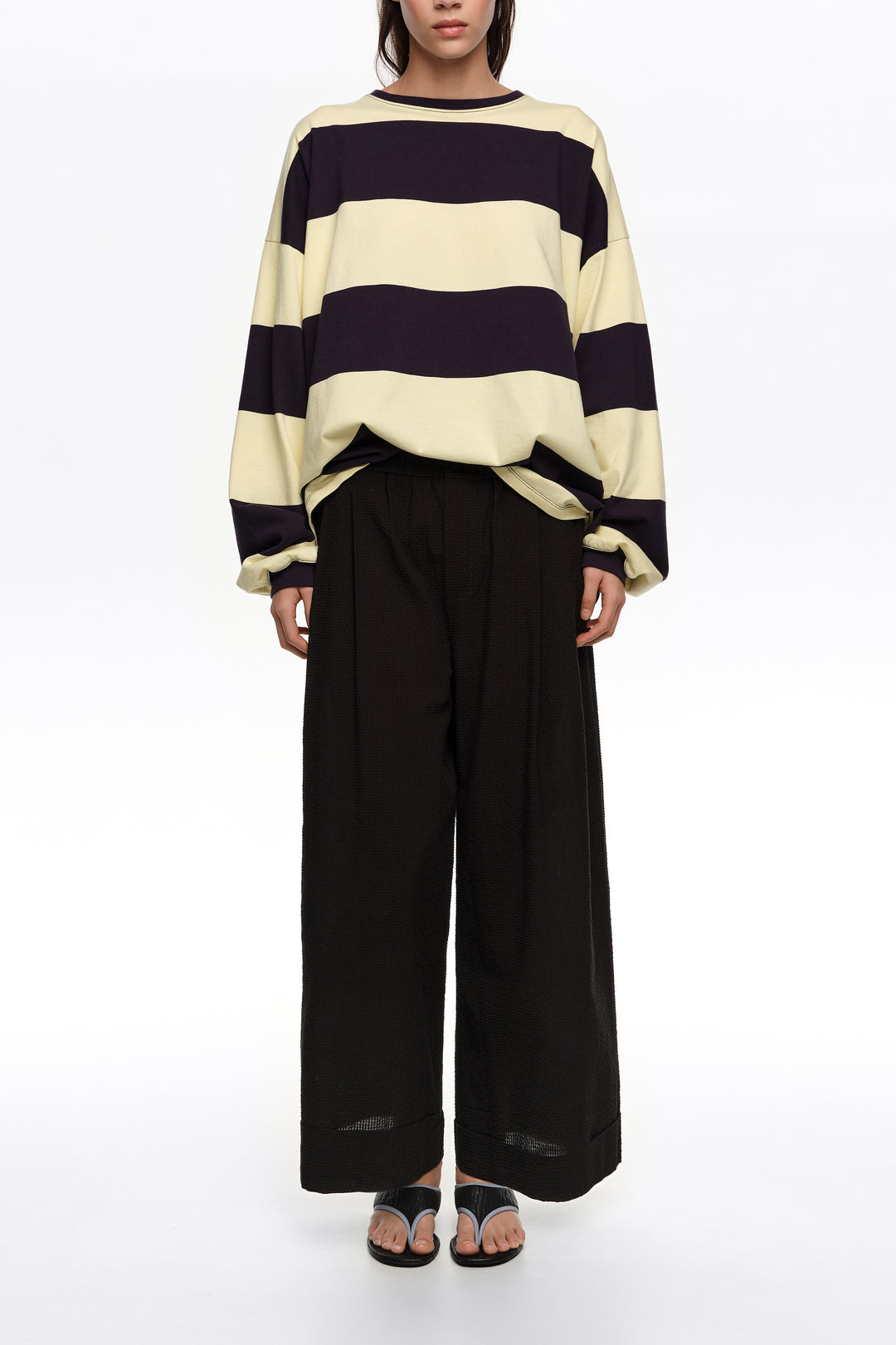 Black textured bell-bottom trousers