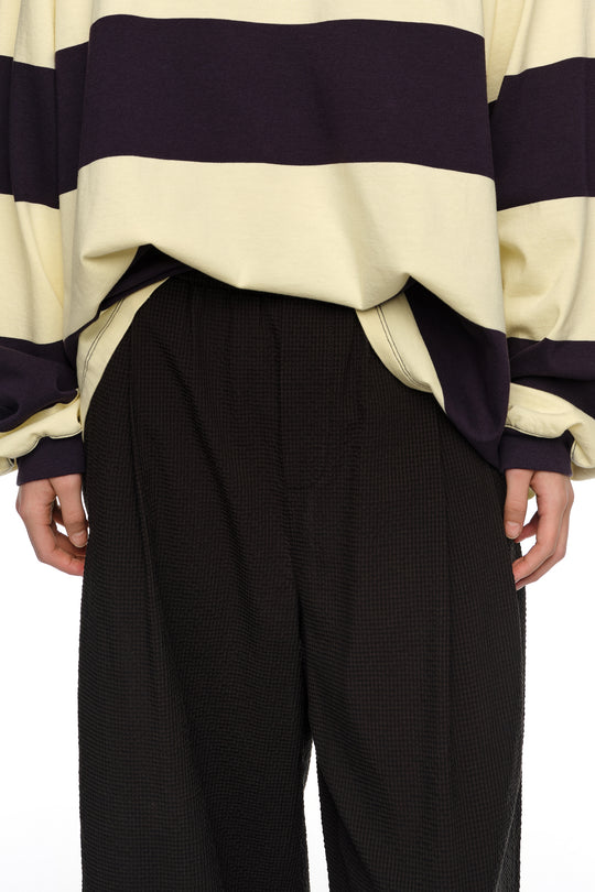 Black textured bell-bottom trousers