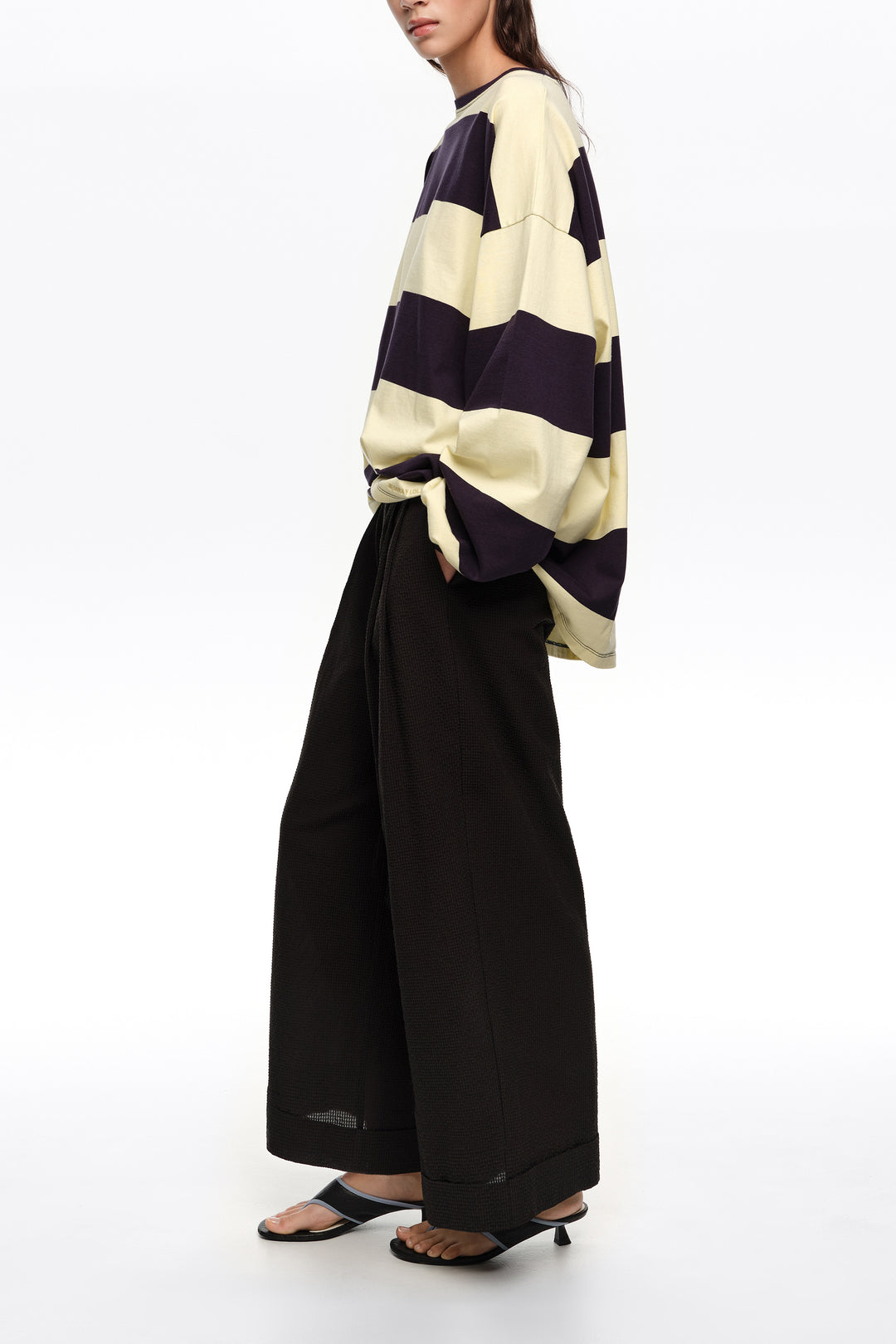 Black textured bell-bottom trousers