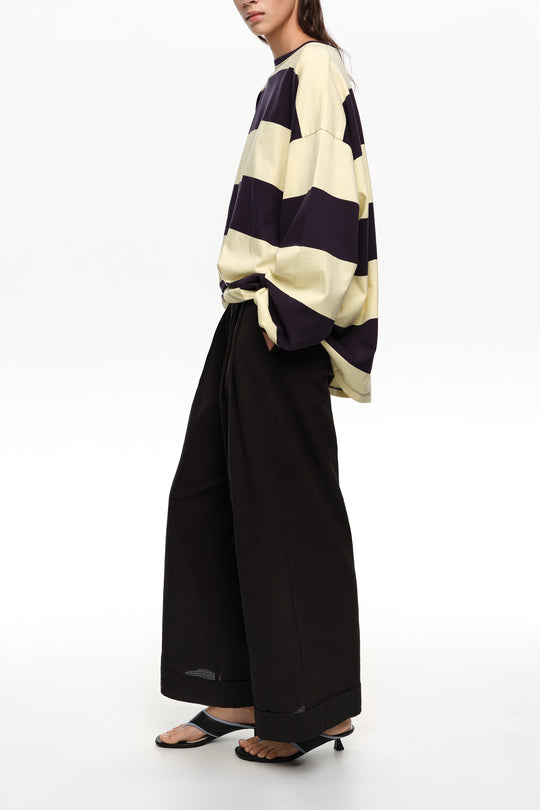 Black textured bell-bottom trousers