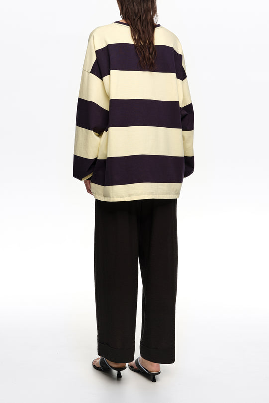 Black textured bell-bottom trousers