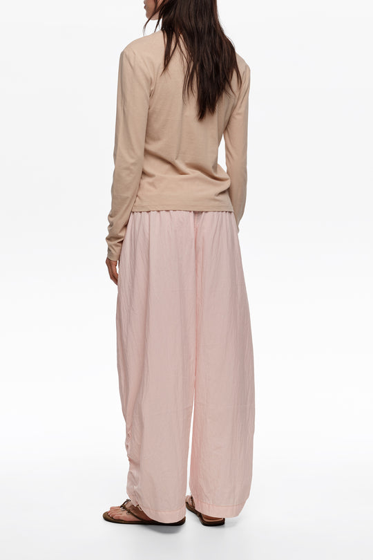 Light pink gathered jogger trousers