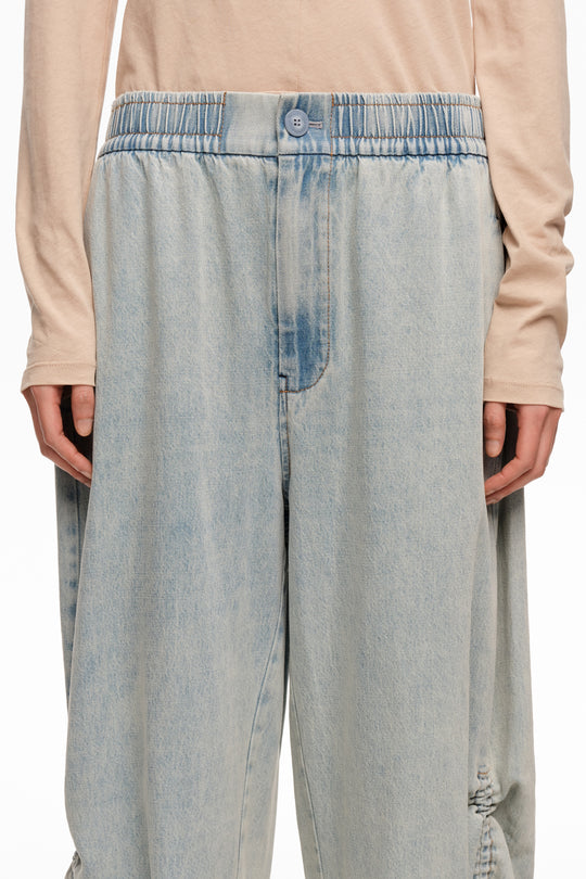 Light blue denim joggers with gathering