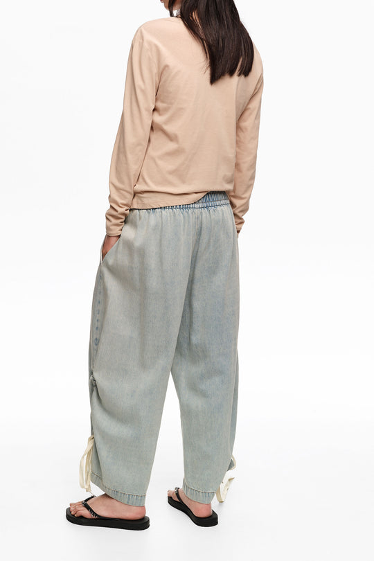 Light blue denim joggers with gathering