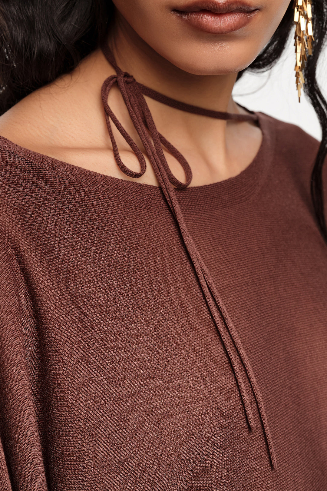 Brown boat neckline crossover ties sweater