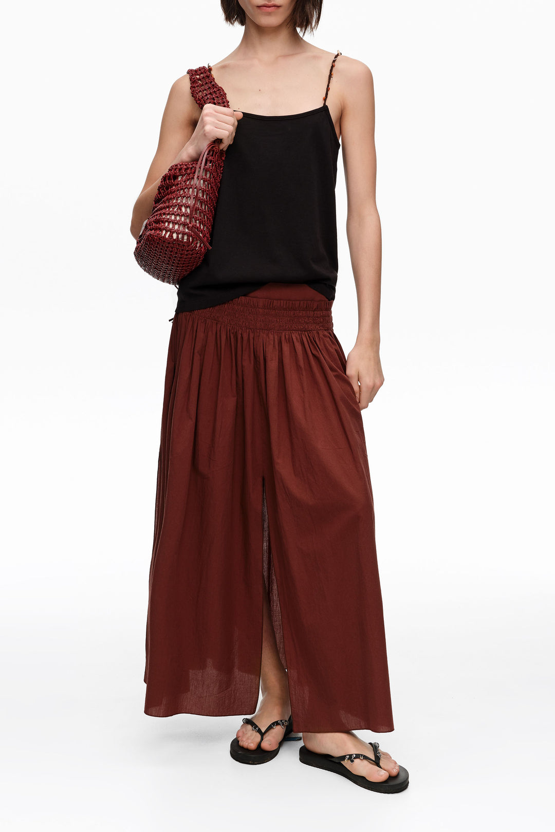 Black strappy top with decorative stones