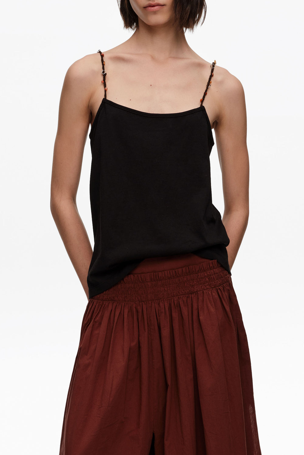 Black strappy top with decorative stones