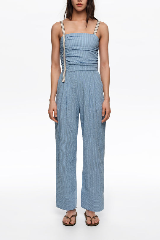 Blue striped jumpsuit with gathered straps