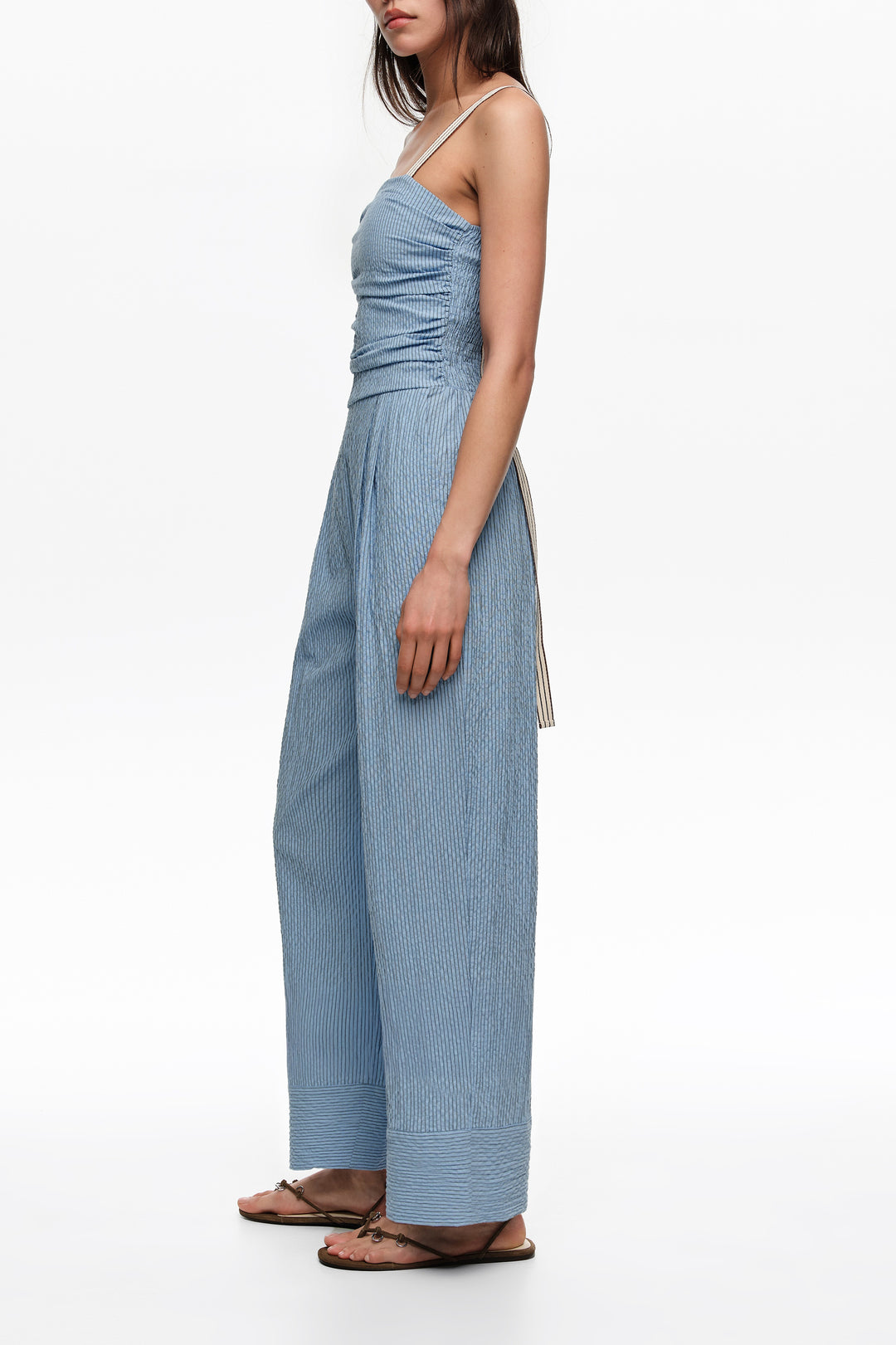 Blue striped jumpsuit with gathered straps