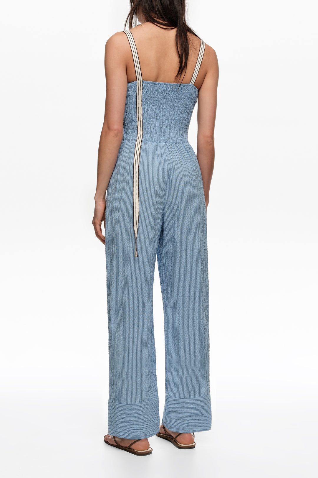 Blue striped jumpsuit with gathered straps