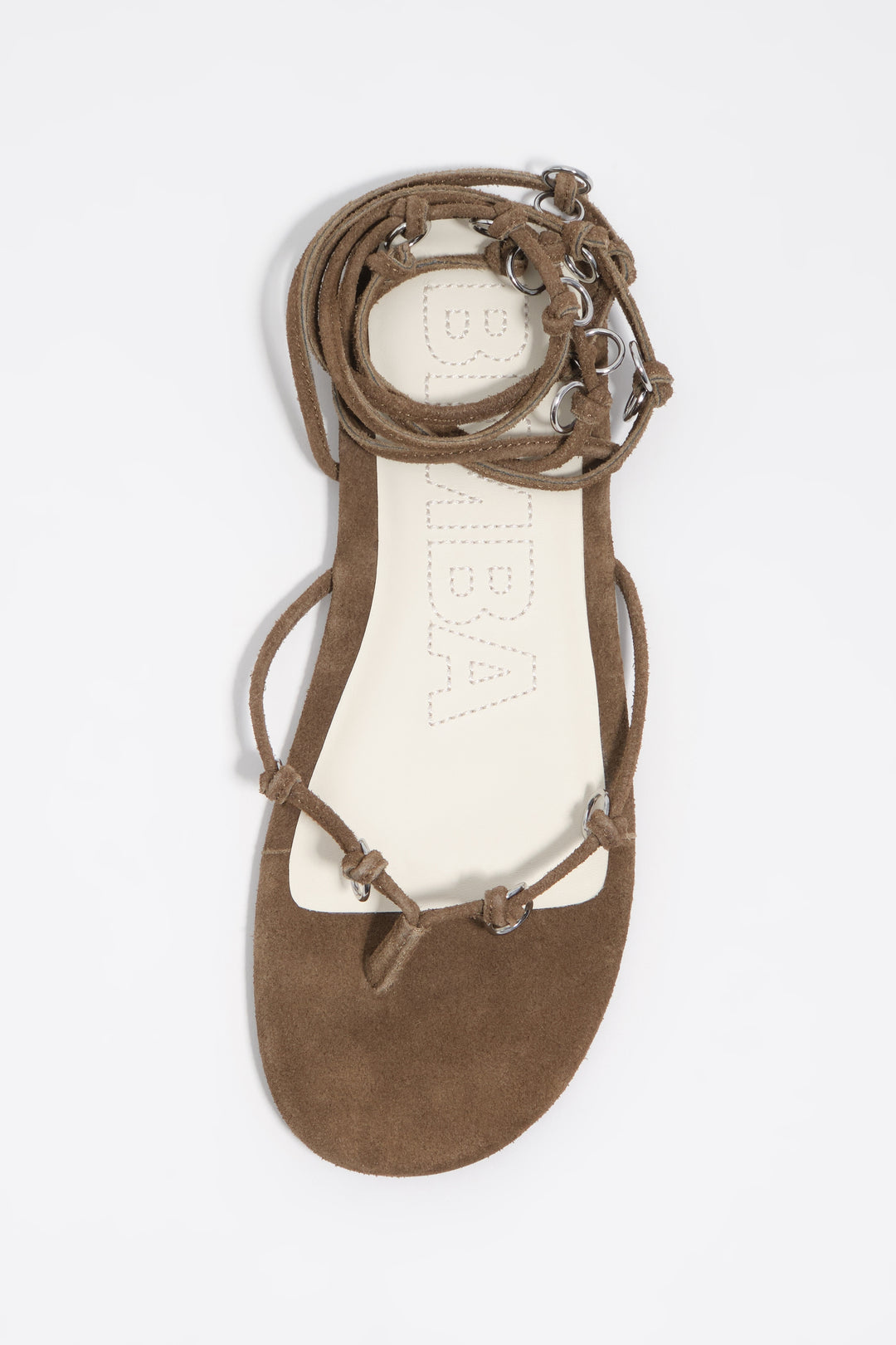 Olive suede sandal with piercings