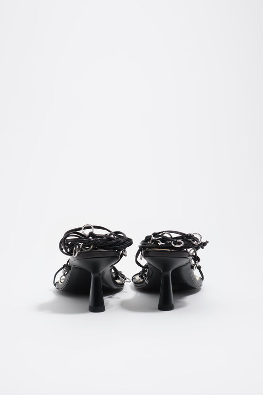 Black leather heeled sandal with piercings