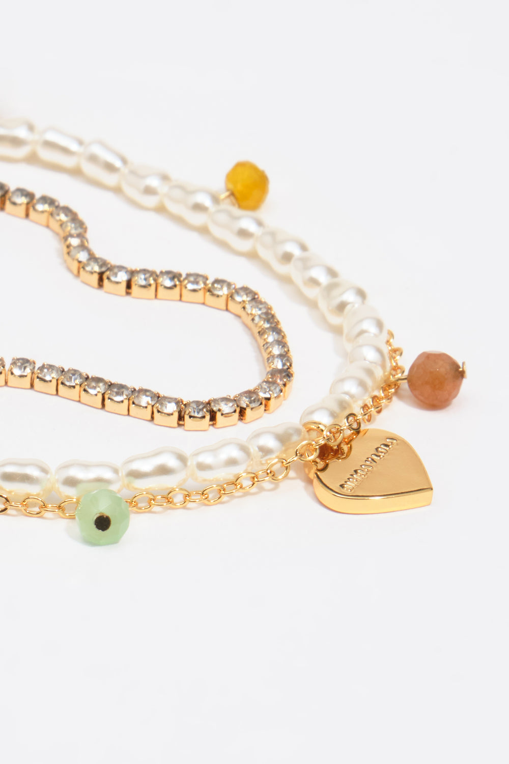 perlas y piedras corazón logo