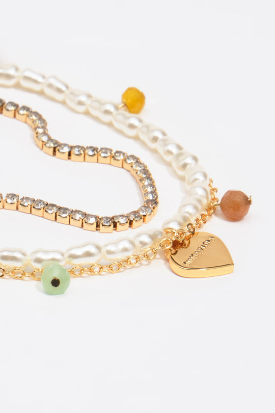perlas y piedras corazón logo