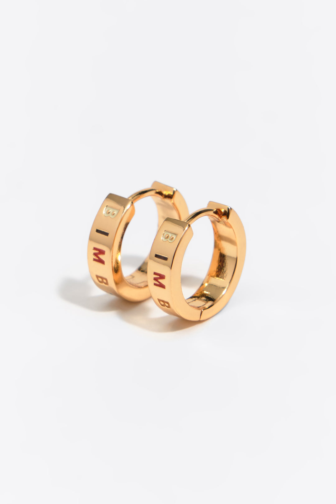 Small gold and multicolored logo hoop earrings