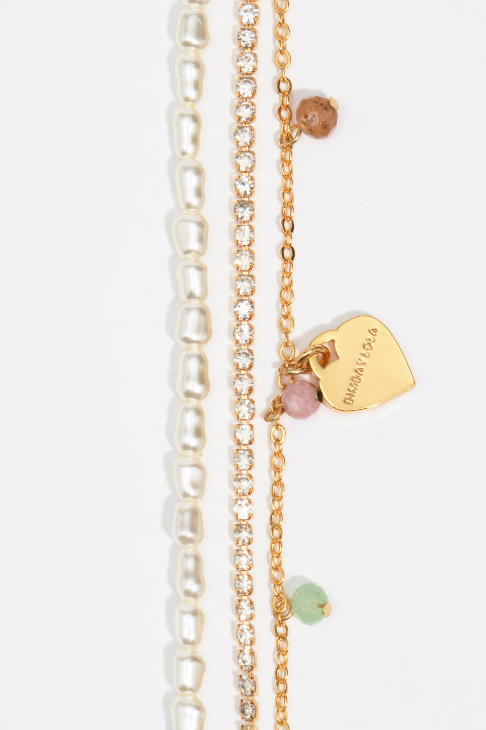 perlas y piedras logo corazón