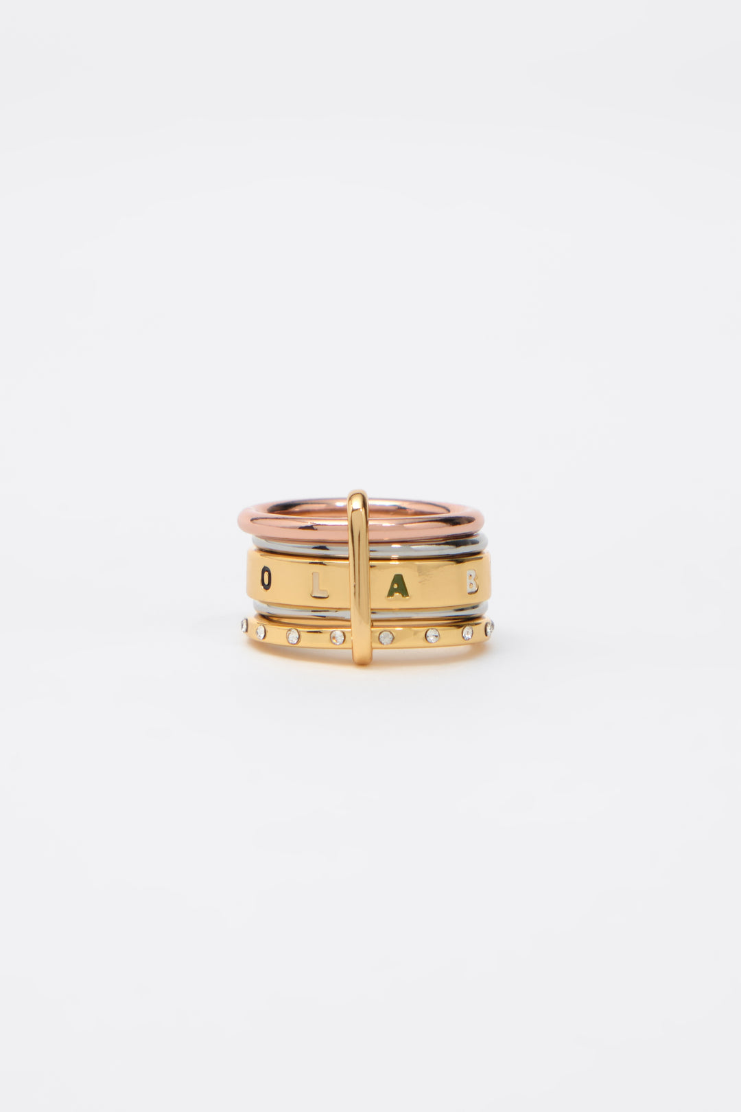 Ring with multi-gold bands and multicolored logo crystals