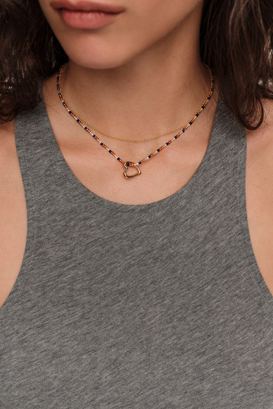 Double chain necklace with textured heart and brown crystals