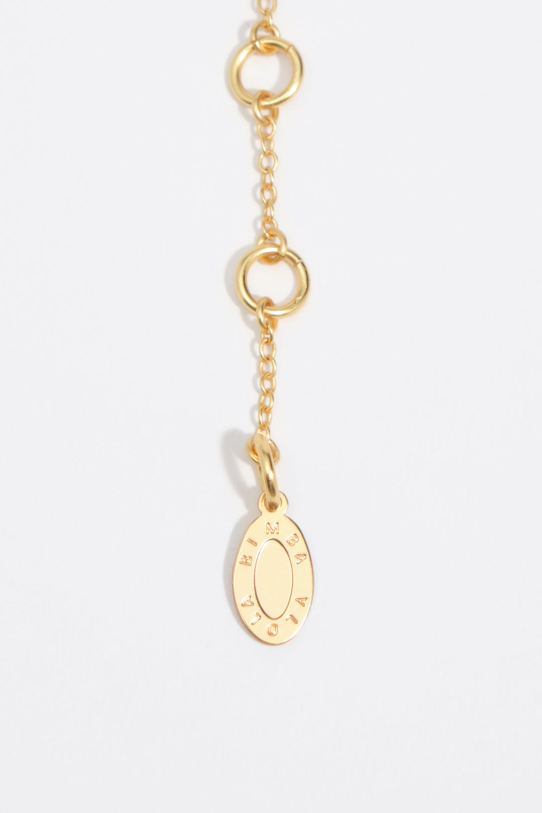 Double chain necklace with textured heart and brown crystals