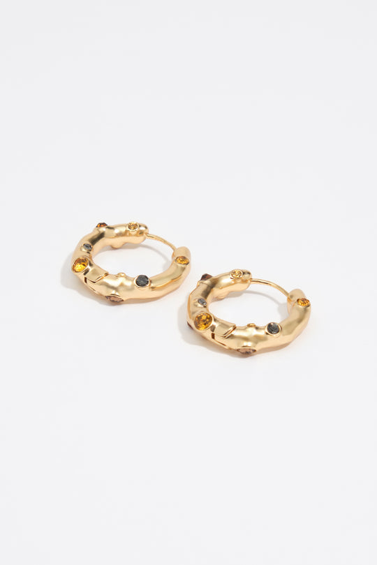 Hoop earrings with topaz crystals and gold-textured metal
