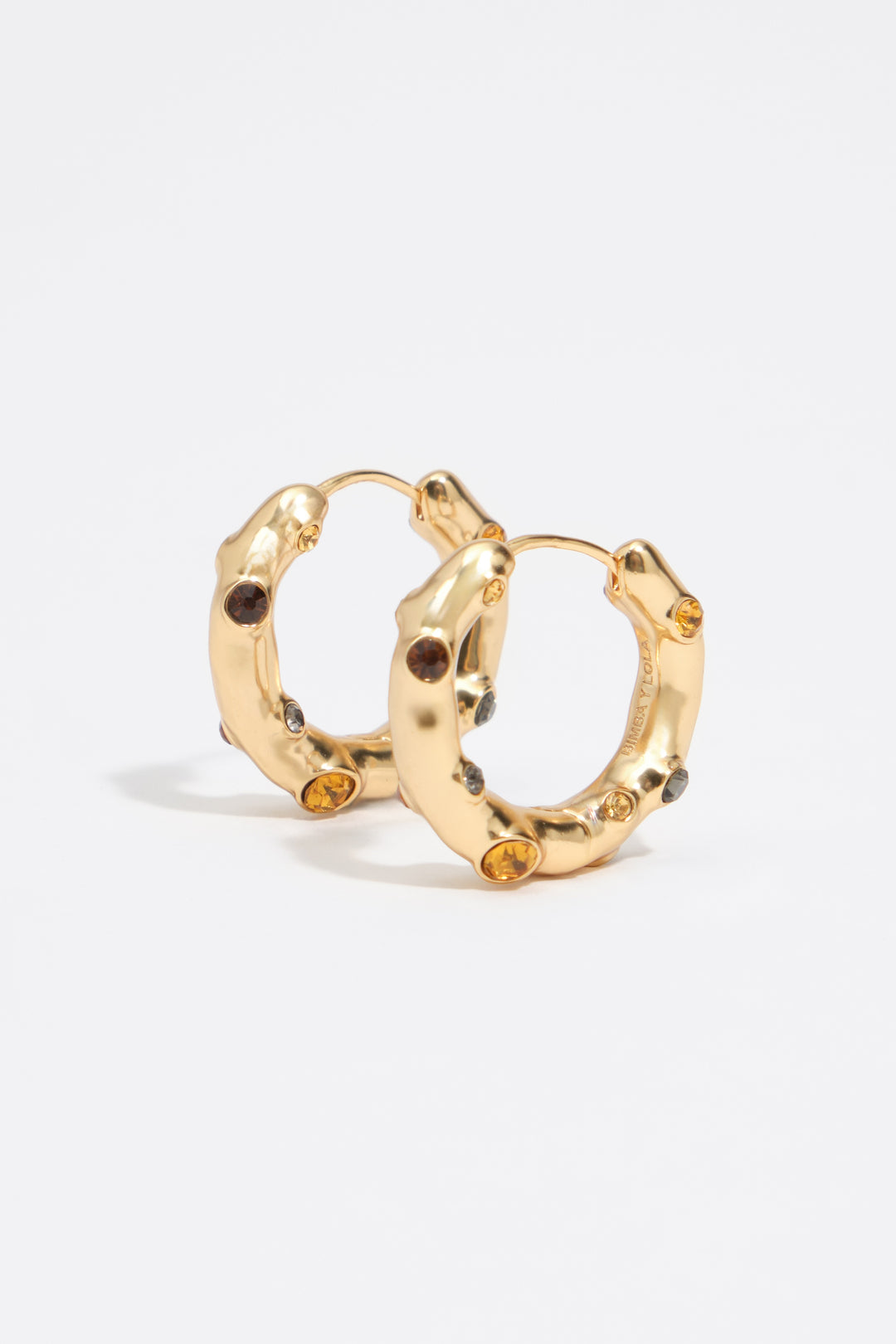Hoop earrings with topaz crystals and gold-textured metal