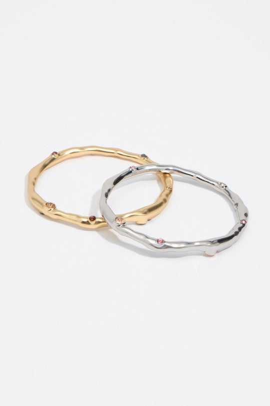 Set of 2 gold and silver textured metal bracelets with crystals