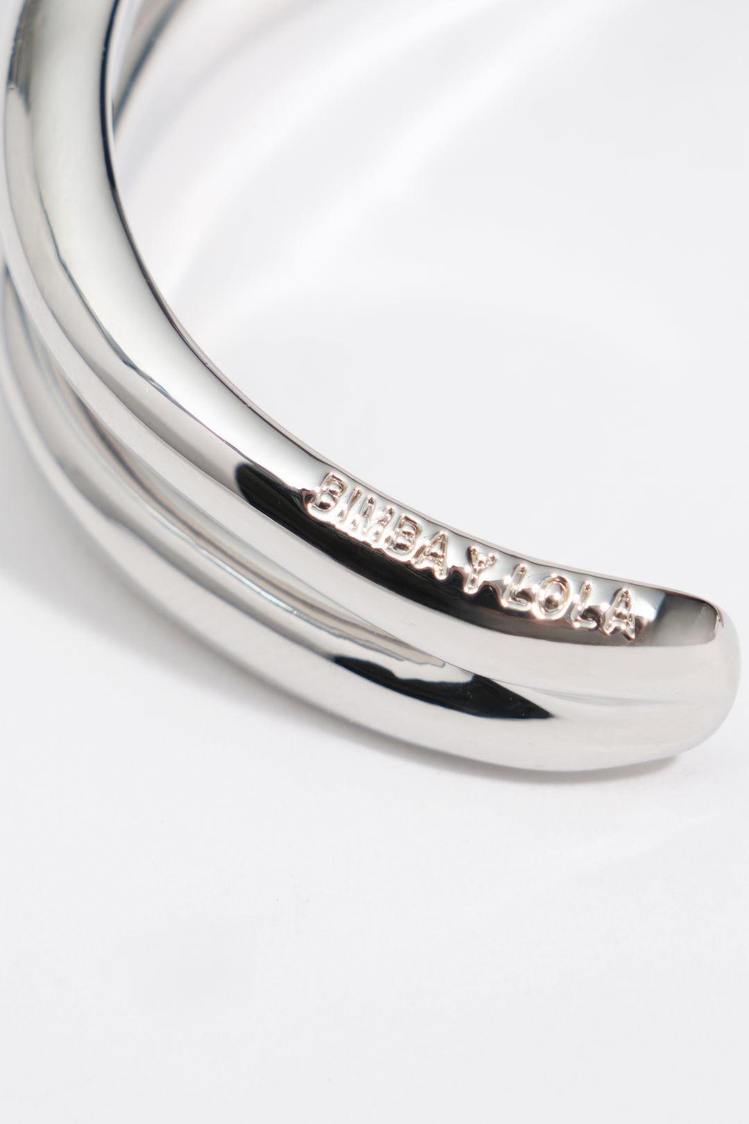 Irregular band bracelet silver metallic finish
