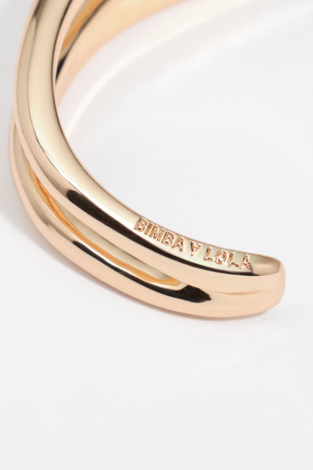 Irregular bands bracelet gold metal