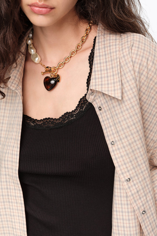 Chain and pearl necklace with amber resin heart