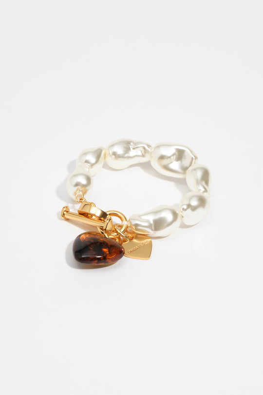 Elastic bracelet with pearls and amber resin heart