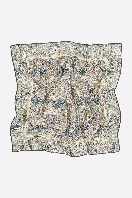 Sand-colored floral scarf with logo frame
