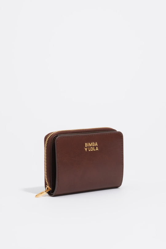 Dark tan leather flap purse