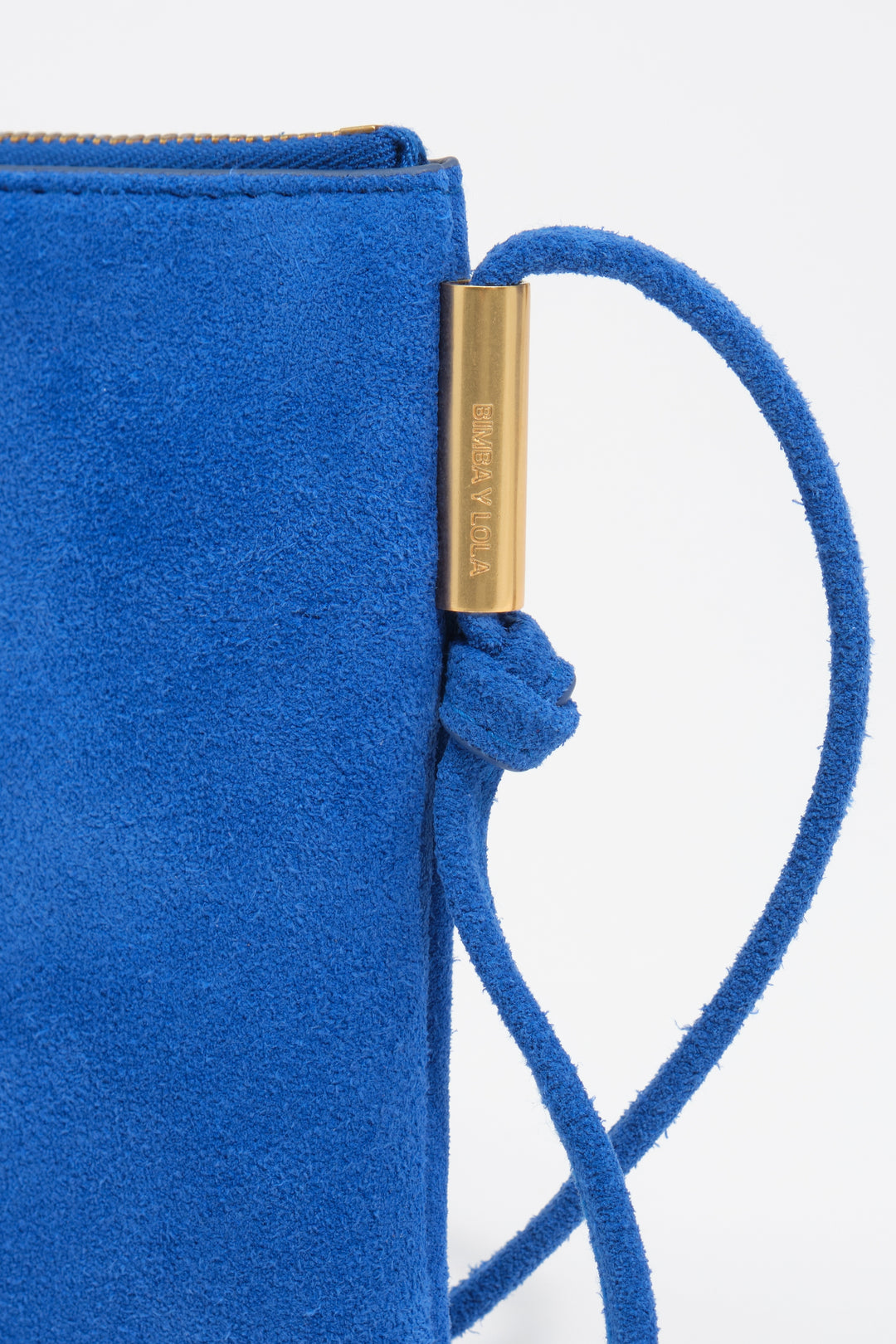 Small electric blue suede clutch bag