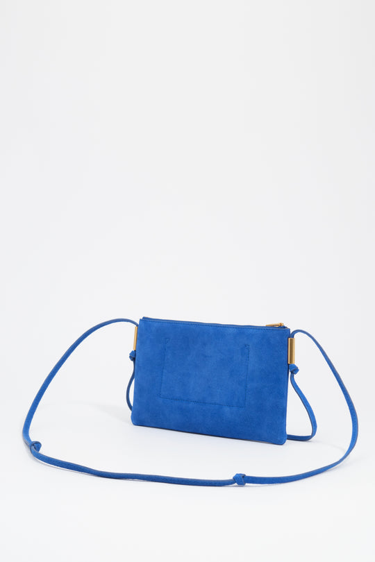 Small electric blue suede clutch bag
