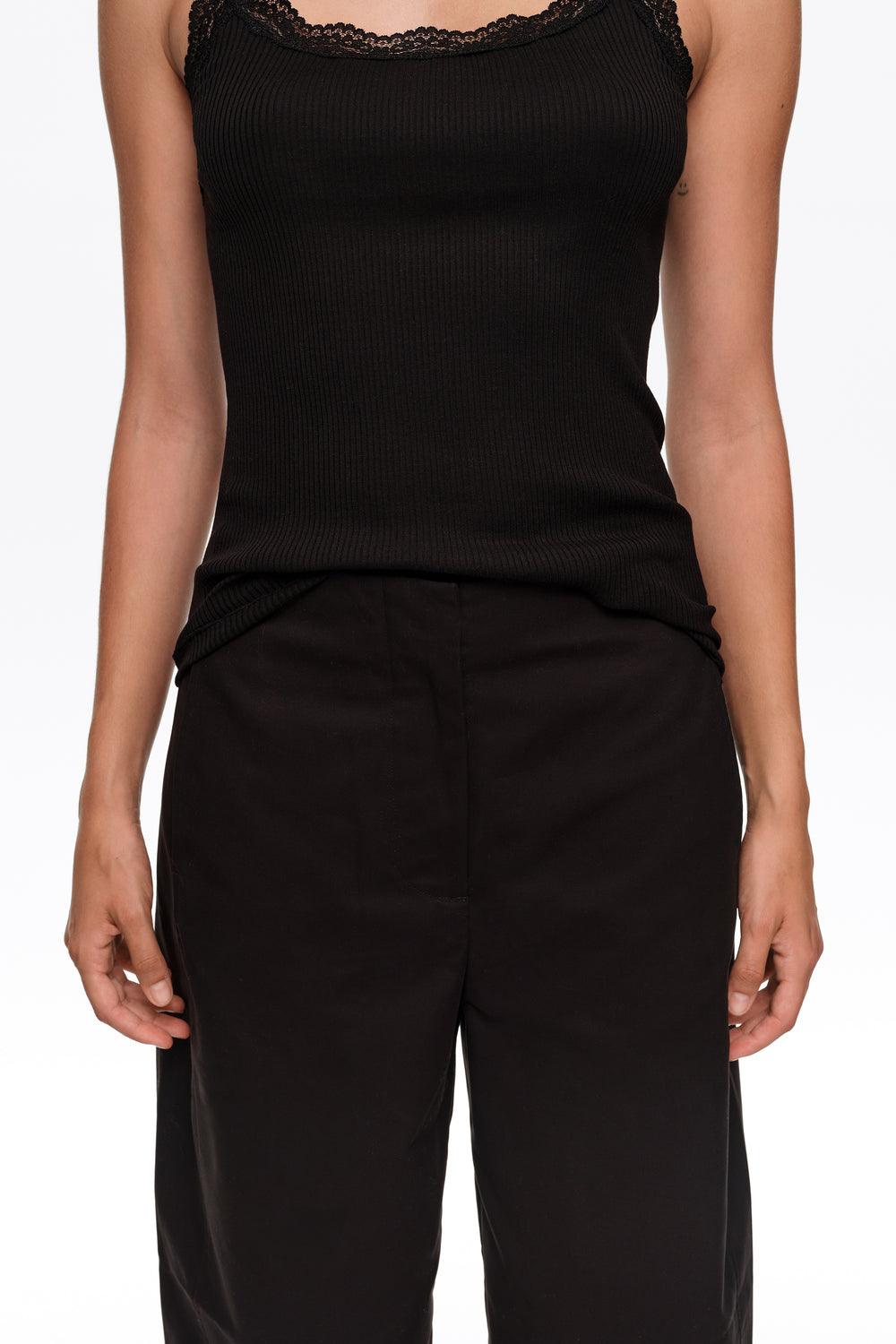 Black barrel trousers with decorative stitching