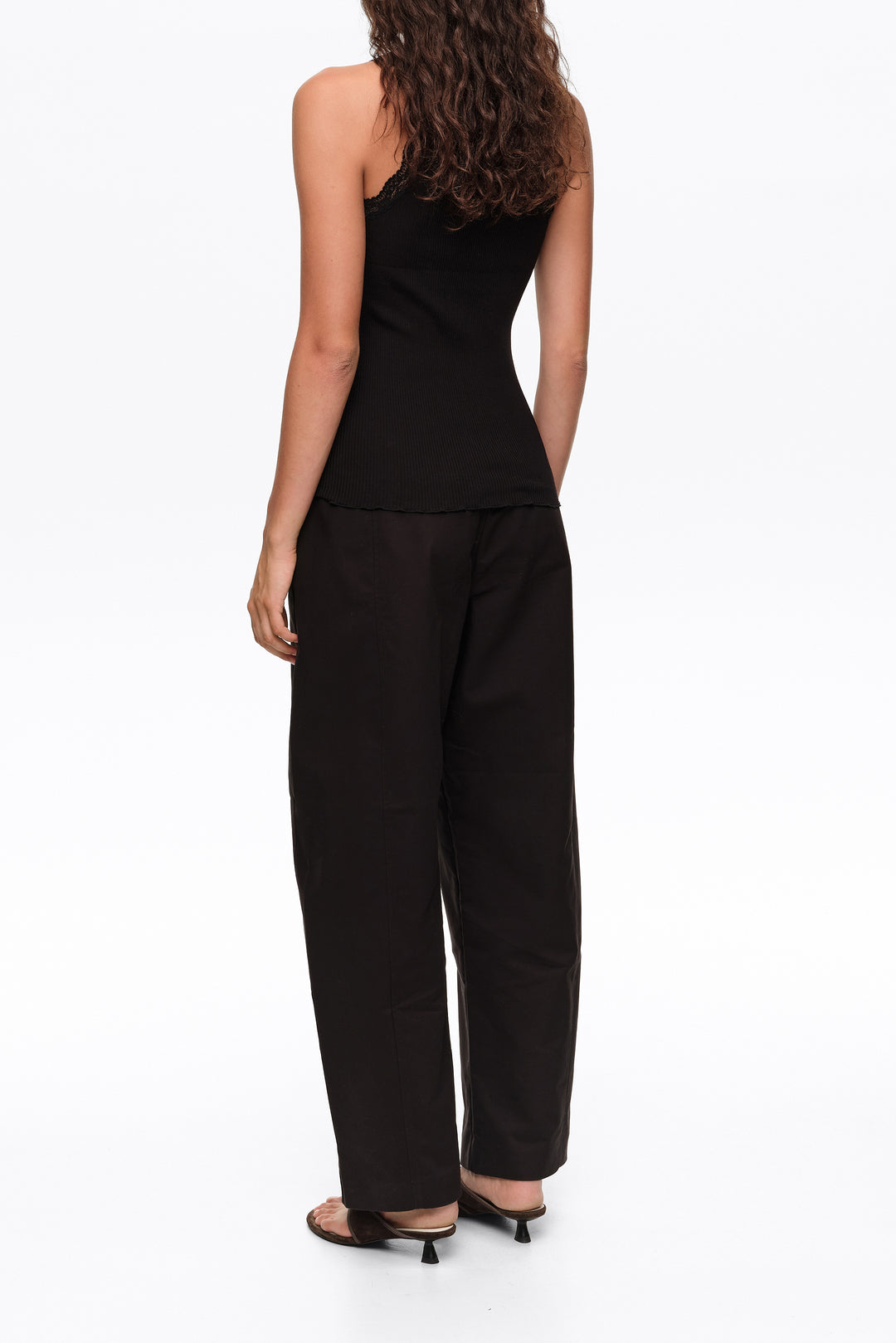 Black barrel trousers with decorative stitching