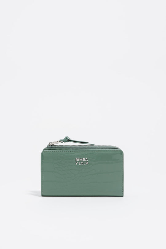 Shiny pastel green textured purse