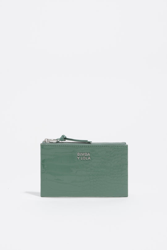 Shiny pastel green textured coin purse