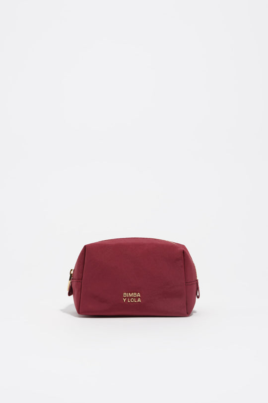 Small burgundy nylon make-up case