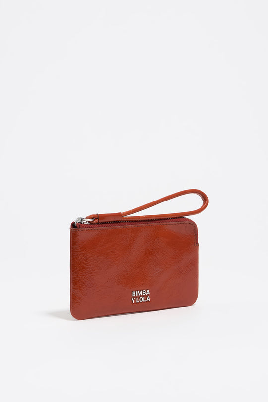 Small burnt orange leather coin purse