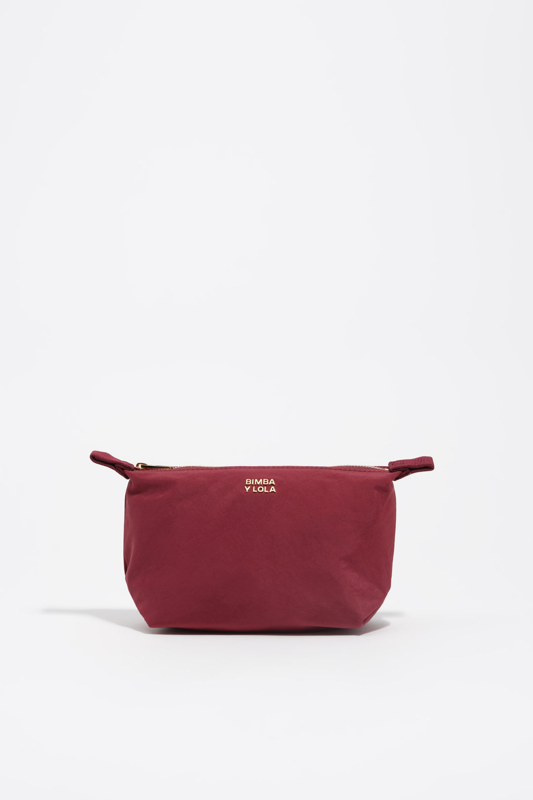 Small burgundy nylon Trapecio make-up case