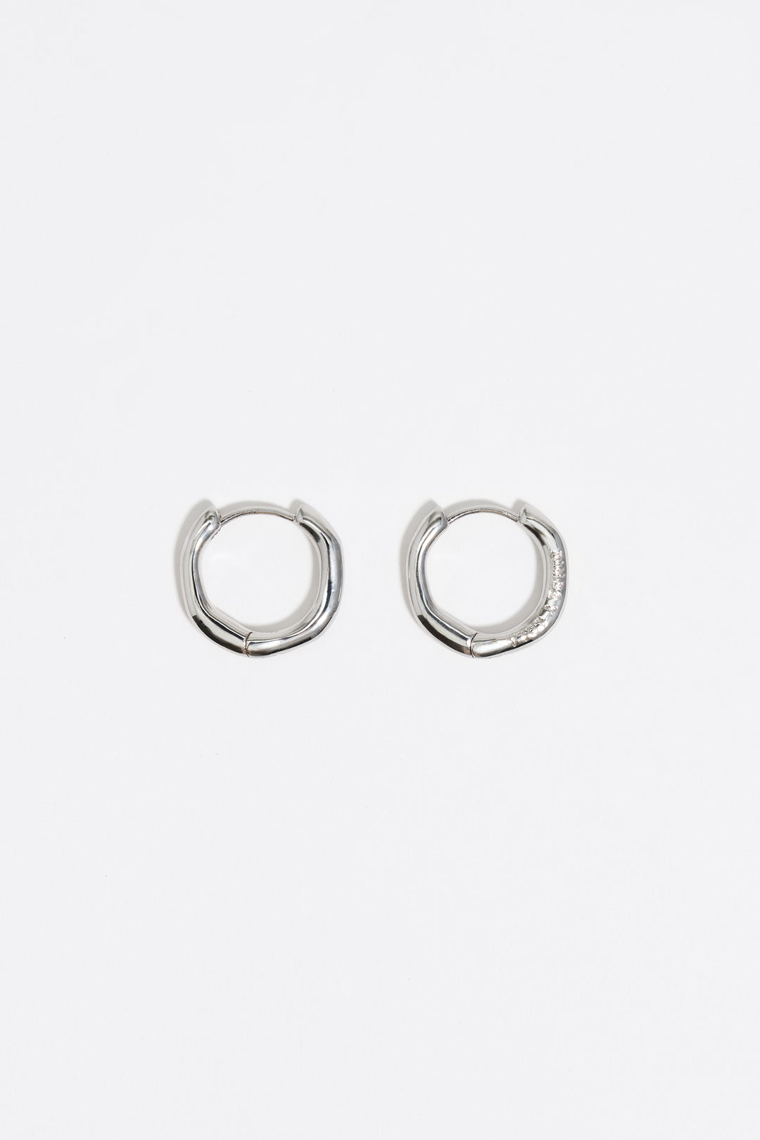 Silver irregular hoop earrings