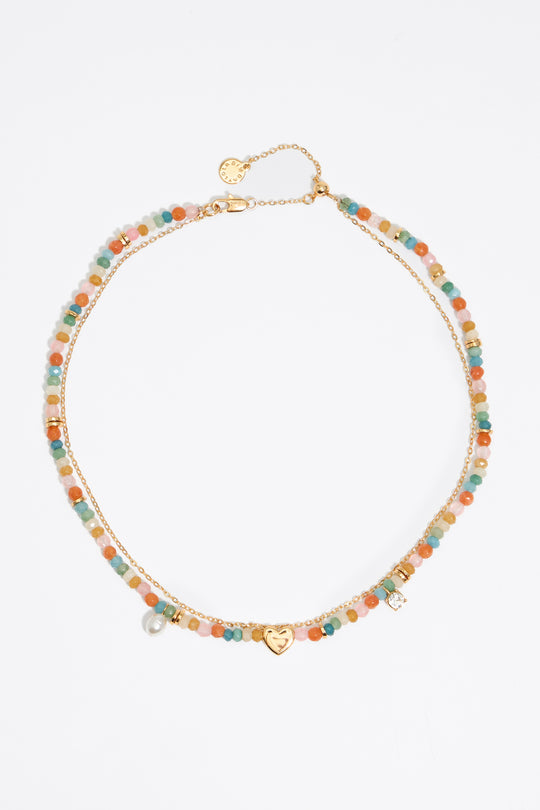 Pink stones and gold heart necklace